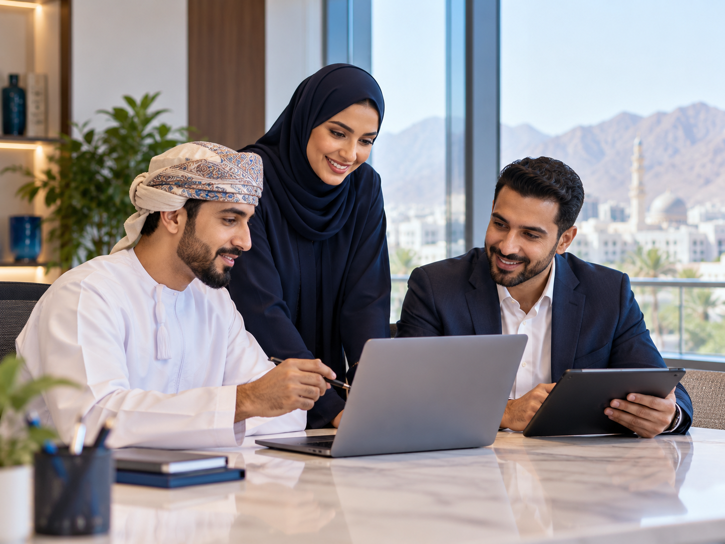 Business professionals collaborating in Oman